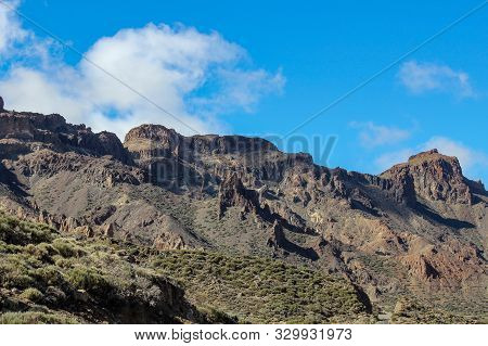 View On The Steep Coast Of Los Gigantes On Canary Island Tenerife With Rocks In Different Colors