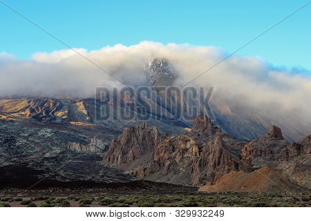 View on the steep coast of Los Gigantes on canary island tenerife with rocks in different colors