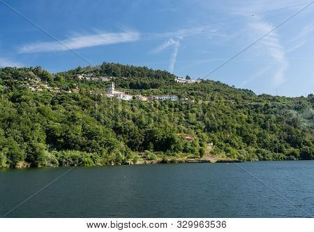 Whitewashed Old Alpendurada Convent On The Banks Of The River Douro In Portugal