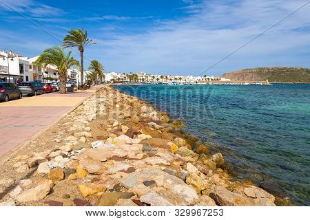 Menorca, Spain - October 12, 2019: The Seafront Promenade And Port In Fornells, Menorca, Spain