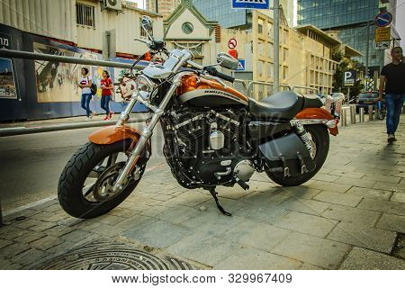 Israel. Tel Aviv. 15.04.2018. Brown Harley-davidson Motorcycle In The Street