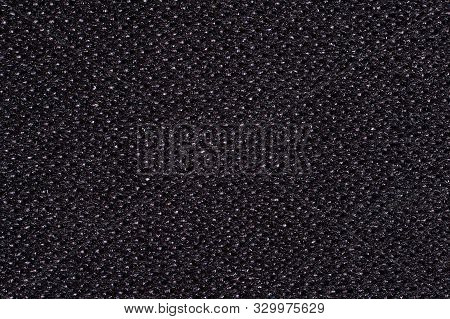 Abstract Background. Black Kevlar Fabric Close-up. Macro Photography
