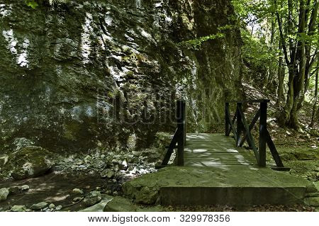 Summer Walk Through The Maze Of Teteven Balkan With High Peaks, River, Bridge And Mossy Steep Cliff,