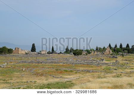 Antique Ruins And Limestone Blocks In Hierapolis, Turkey. Ancient Antique City.
