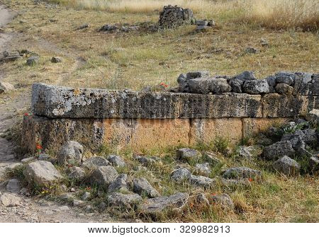 Antique Ruins And Limestone Blocks In Hierapolis, Turkey. Ancient Antique City.
