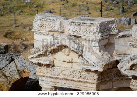 Bas-reliefs Of Antique Scenes On The Gables Of The Amphitheater In Hierapolis, Turkey. Ancient Antiq
