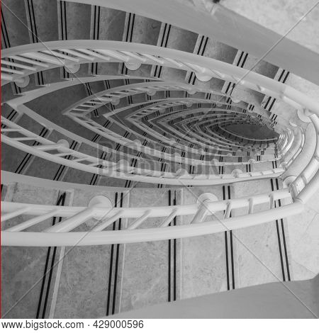 A top view of a staircase well. Abstract architectural design and pattern.