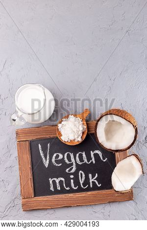 Chalk Board And Vegan Powdered Coconut Milk, Lactose Free Milk In A Glass Jar, Vertical, Top View, C