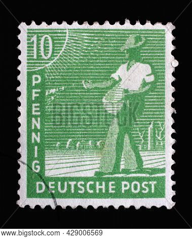 ZAGREB, CROATIA - SEPTEMBER 05, 2014: Stamp printed in Germany, American-British-Soviet Occupation (Trizone) shows Sower, circa 1948