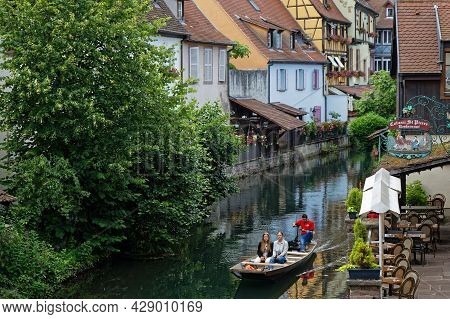 Colmar, France, June 25, 2021 : Cruise On The Lauch River. Petite Venise Is A Picturesque Tourist Ar