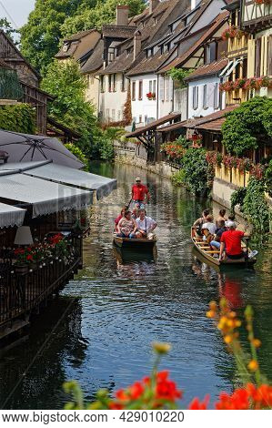 Colmar, France, June 27, 2021 : Cruise On The Lauch River. Petite Venise Is A Picturesque Tourist Ar