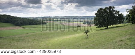 Rural Countryside Summer Landscape With Green Meadows And Trees In French Ardennes Near Charleville 
