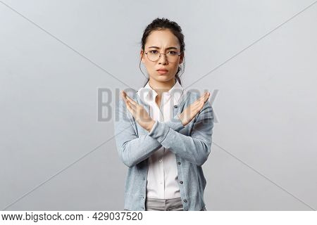 We Must End It. Serious-looking Determined Young Confident Asian Woman, Making Cross Stop Sign And L
