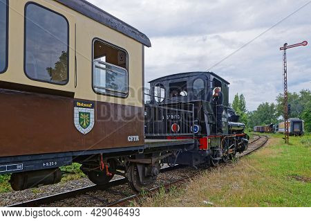 Neuf-brisach, France, June 27, 2021 : Old Train On The Railroad And Signs