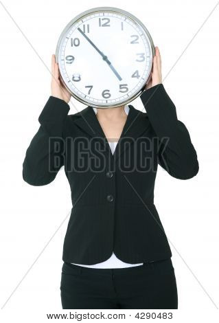 Businesswoman Covering Her Head With Clock