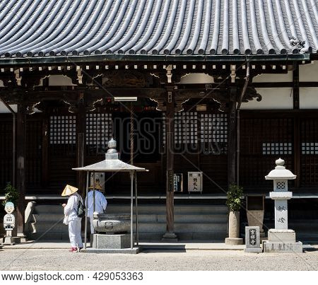 Saijo, Ehime Prefecture, Japan - April 12, 2018: O-henro Buddhist Pilgrims At Kichijoji, Temple Numb