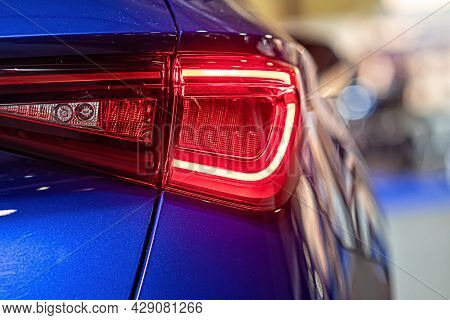 Close-up Of A Red Led Taillight On A Modern Car, Detail On The Rear Light Of A Car