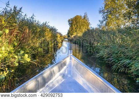 Aluminum Boat Stern. Boat Trip In Nature Reserve Weerribben In The Netherlands.