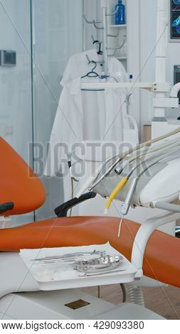 Revealing Shot Of Empty Medical Stomatology Orthodontic Hospital Office With Nobody In It. Professio