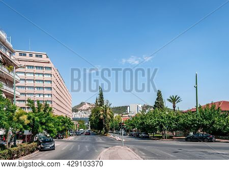 Athens, Greece - July 11 2021: View Of Vasileos Alexandrou Ave, With The Divani Caravel Hotel On The