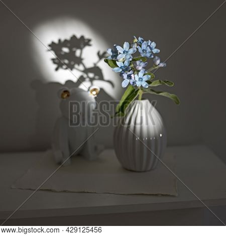 Flower Hackelia Velutina In A White Fluted Vase In The Style Of The Seventies, A Figurine Of Fox. Sc
