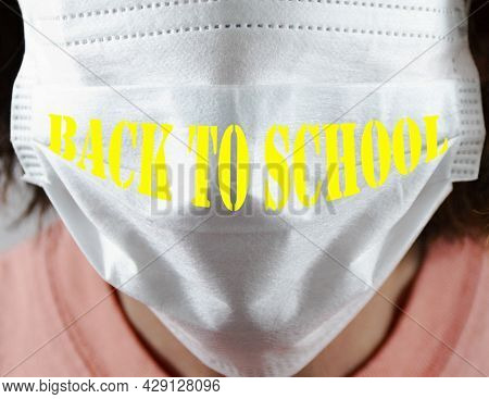 Back To School Written On A Whte Face Mask As Another School Ear Approaches