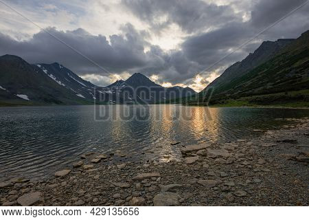 Last Rays Of Sunset On The Hadatayoganlor Lake. Polar Ural, Russia