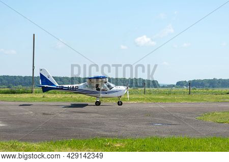 Gorodok. Ukraine. June 6, 2021. Tsuniv Airfield. Training Aircraft, Taxiing To The Runway. Sport Ext
