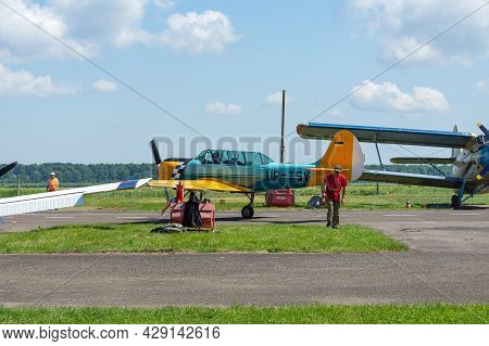 Gorodok. Ukraine. June 6, 2021. Tsuniv Airfield. Training Aircraft, Taxiing To The Runway. Sport Ext