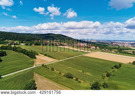 Aerial View Of Beautiful Landscape In Mountains With Forest And Fields. Sleza Mountain Near Wroclaw 