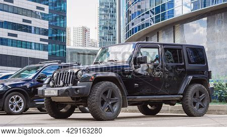 Black Jeep Wrangler Unlimited 4x4 Suv Car Parked On The Street In The City. Moscow, Russia - August 