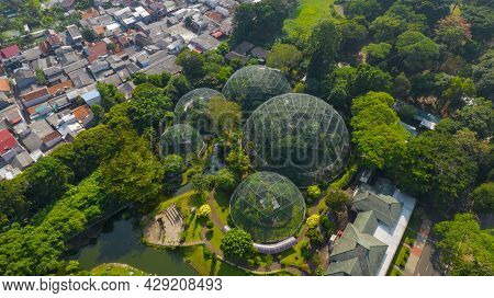 Aerial View Of Taman Mini Indonesia Indah As National Landmark In Indonesia With Noise Cloud. Jakart