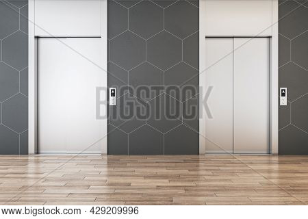 Modern Office Lobby Interior With Steel Elevators, Wooden Flooring And Tile Wall. 3d Rendering