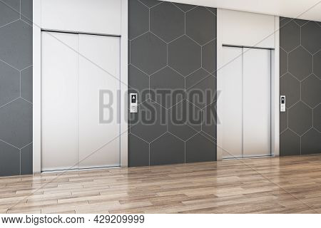 Modern Office Lobby Interior With Steel Elevators, Wooden Flooring And Tile Wall. 3d Rendering