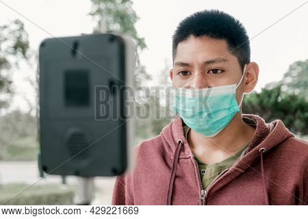 The Asian Tourist Man Has Checked Body Temperature With A Thermal Temperature Scanner Detector, New 
