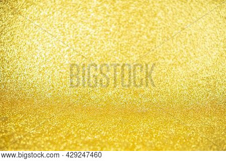 Lights On Gold Background. Silver Sparkle Glitter Bokeh Abstract Bright Blur For Merry Christmas And