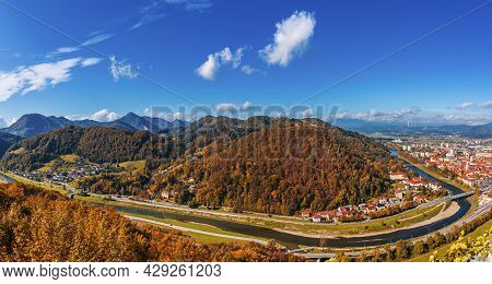Aerial Panoramic Autumn View To The City Celje In Slovenia. Autumn Trees, Green Meadows And Red Roof