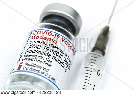 Madrid, Spain- August 6, 2021: Syringe And Vial With Moderna Covid-19 Vaccine On White Background
