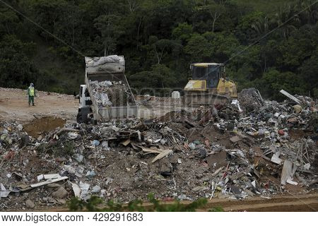 Truck Deposits Garbage In A Landfill In The City Of Salvador
