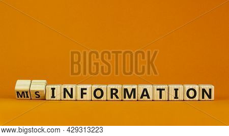 Information Or Misinformation Symbol. Turned Cubes And Changed The Word Misinformation To Informatio
