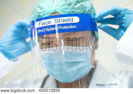Asian Doctor Wearing Face Shield And Ppe Suit New Normal To Check Patient Protect Safety Infection C