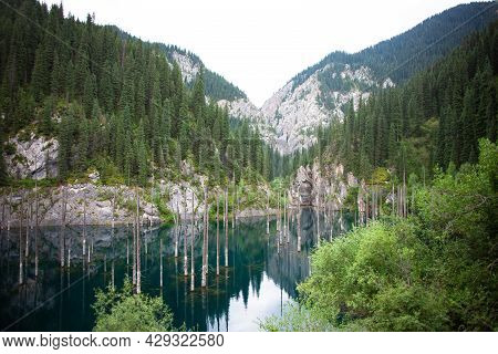Kaindy Lake In Tien Shan Mountain, Kazakhstan.