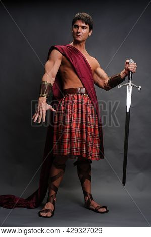 The Sexy Warrior Poses For The Photo.