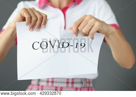 Woman Tears Up Paper That Says Covid-19