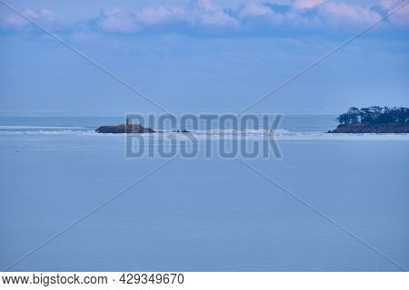 Vanino, Russia - Jan 18, 2021: Vanino Bay In The Tatar Strait In Winter. The Frozen Sea.