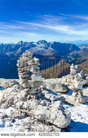 Commemorative stone pyramid. Pordoi is a mountain pass of the Dolomites. South Tyrol. Italy. The Passo-Pordoi pass separates the province of Trento from the province of Belluno.