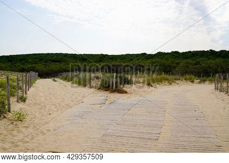 Wooden Pathway In Dune Access To Beach Sea In Lege Cap-ferret Coast Atlantic Ocean In France