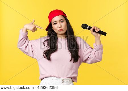 People Emotions, Lifestyle Leisure And Beauty Concept. Cool And Sassy Stylish Female Raper, Girl Sin
