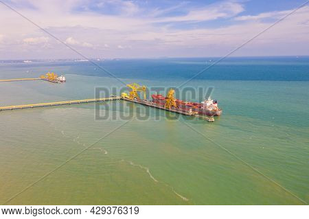 Port Dickson, Malaysia- January 23, 2021: Coal Transport Ship At The Dock Of The   Jimah Power Plant