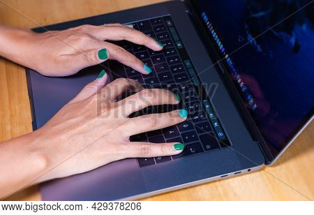 Cyberjaya, Malaysia - October 13, 2020:  Woman Hands Typing On A Computer Keyboard. Female Hands Wri